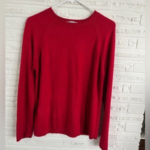 Jennifer Moore red sweater